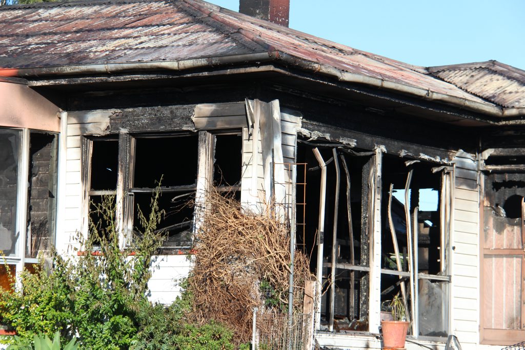 UP IN FLAMES: The Gore St home was already well alight when firefighters arrived early on Saturday morning Photo Erin Smith / Bush Telegraph